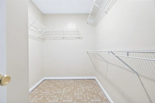 a view of an empty walk in closet