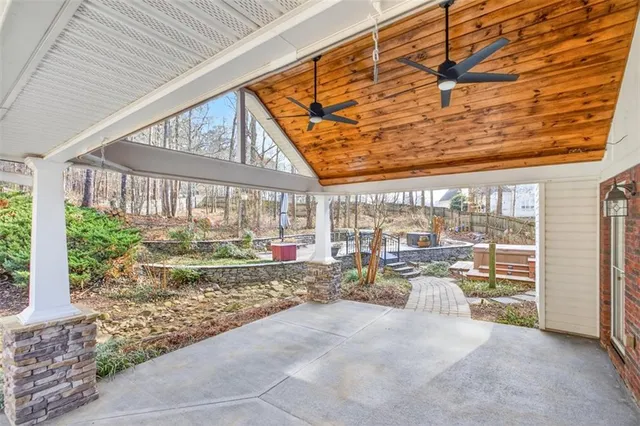 a view of a porch with wooden floor