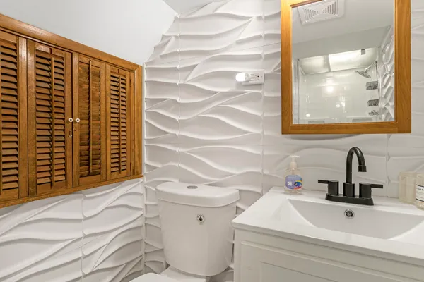 a bathroom with a sink and a toilet
