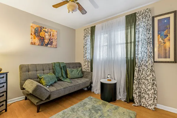 a living room with furniture and a window