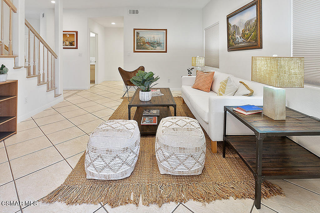 985 Brandon Avenue Simi Valley, CA 93065 - Photo 14 of 40 a living room with furniture and wooden floor