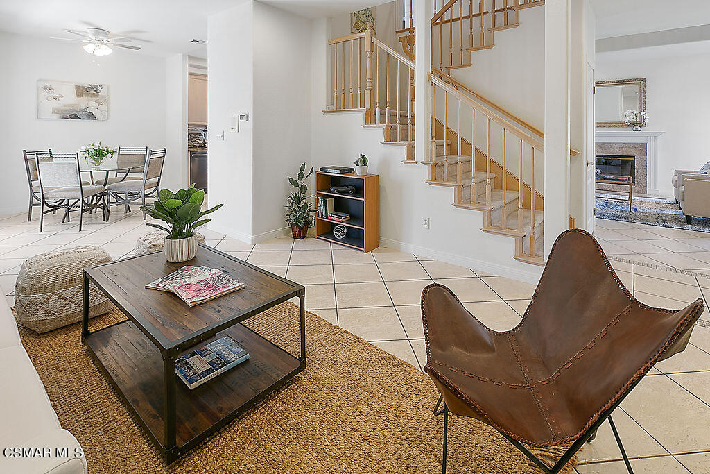 985 Brandon Avenue Simi Valley, CA 93065 - Photo 16 of 40 a living room with furniture rug and a table