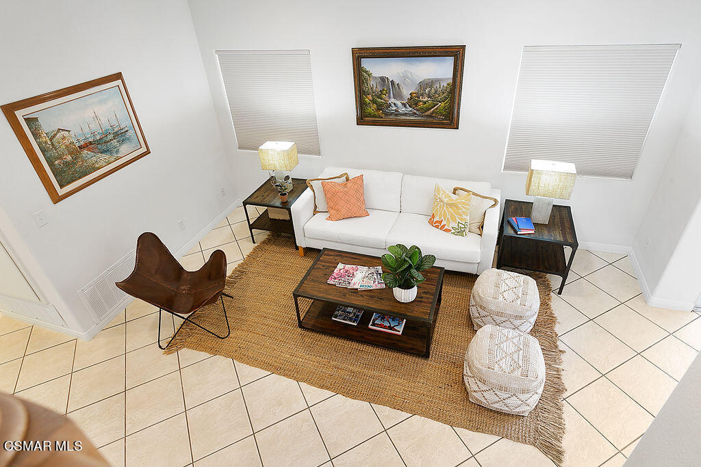 985 Brandon Avenue Simi Valley, CA 93065 - Photo 17 of 40 a living room with furniture and white walls