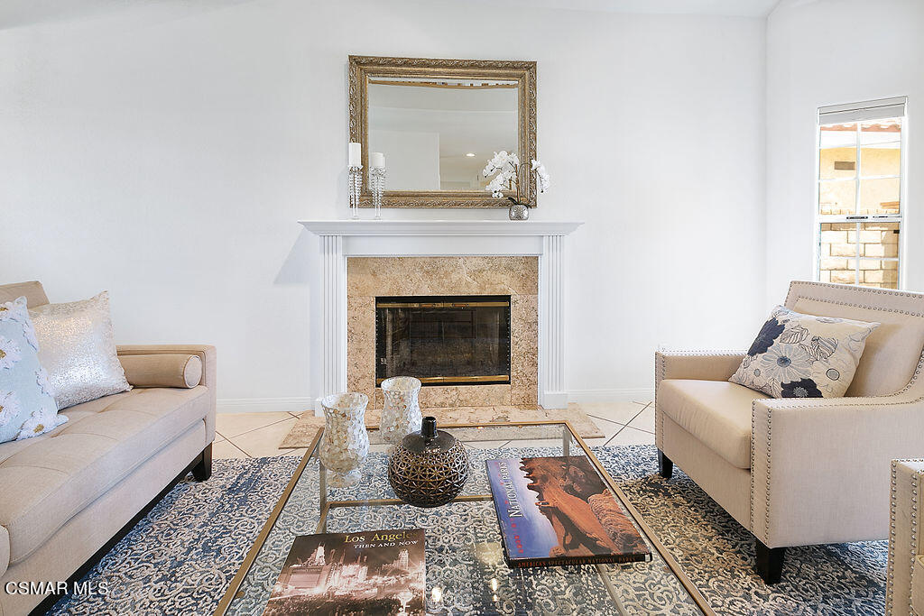 985 Brandon Avenue Simi Valley, CA 93065 - Photo 2 of 40 a living room with furniture and a fireplace