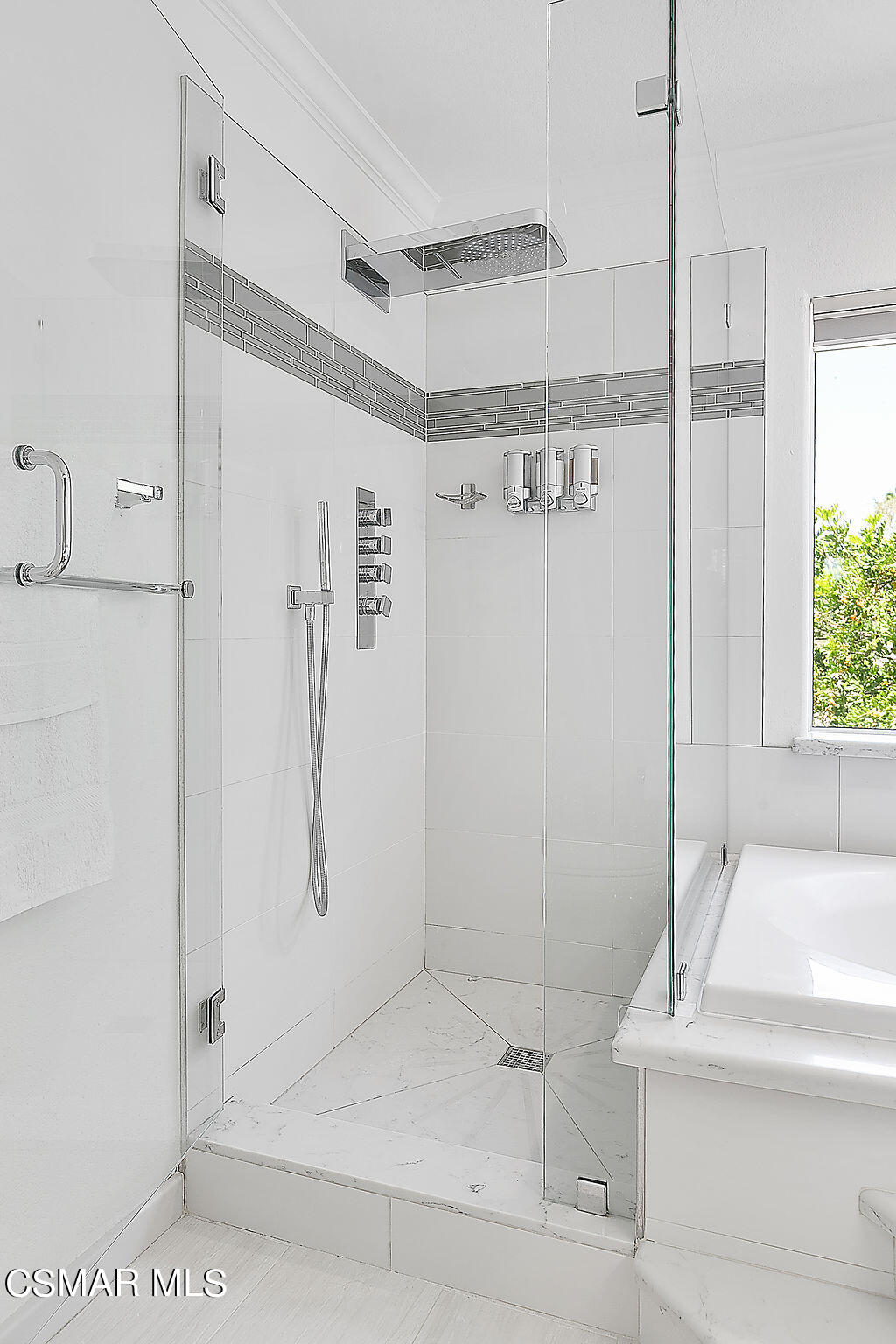 985 Brandon Avenue Simi Valley, CA 93065 - Photo 24 of 40 a bathroom with a bathtub and a shower