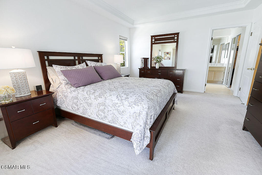 985 Brandon Avenue Simi Valley, CA 93065 - Photo 4 of 40 a bedroom with a bed and wooden floor