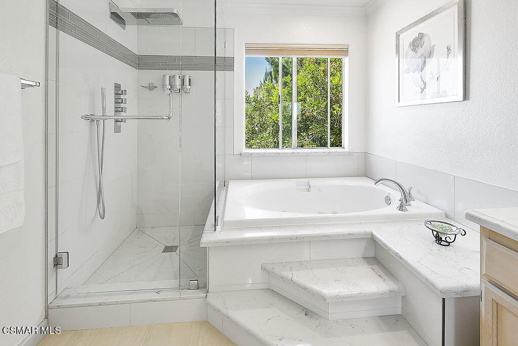 985 Brandon Avenue Simi Valley, CA 93065 - Photo 5 of 40 a white bath tub sitting next to a white sink