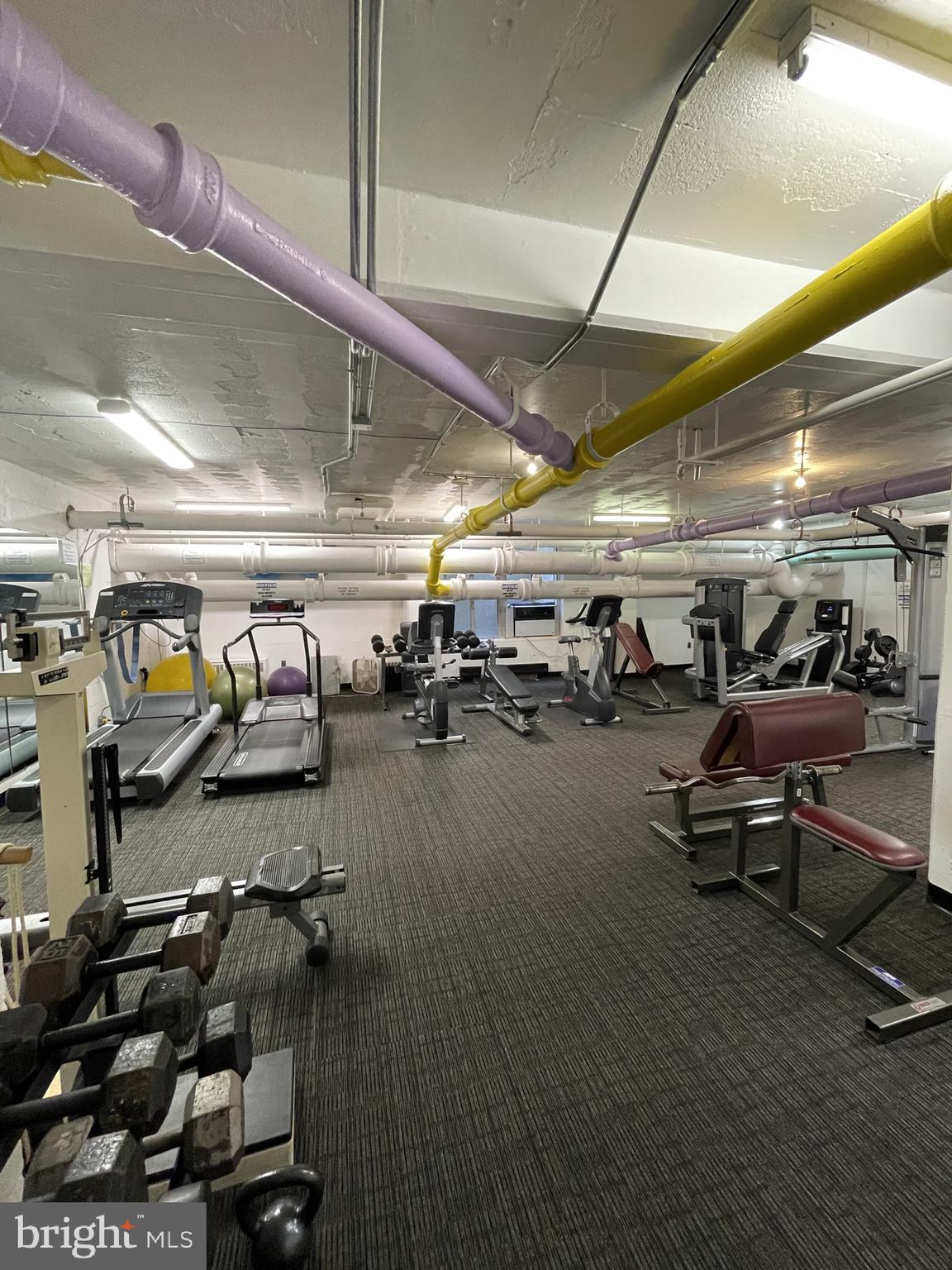 2475 Virginia Avenue Northwest, Unit 411 Washington, DC 20037 - Photo 12 of 20 a view of parking garage with lots of car parked