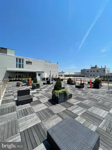 a view of a terrace with sitting area