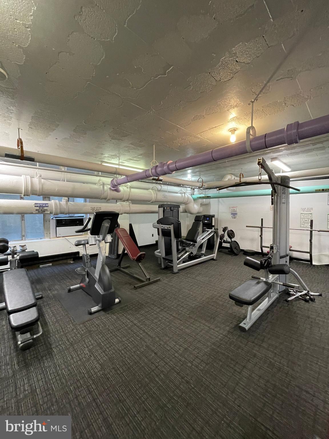 2475 Virginia Avenue Northwest, Unit 411 Washington, DC 20037 - Photo 18 of 20 a view of a room with gym equipment