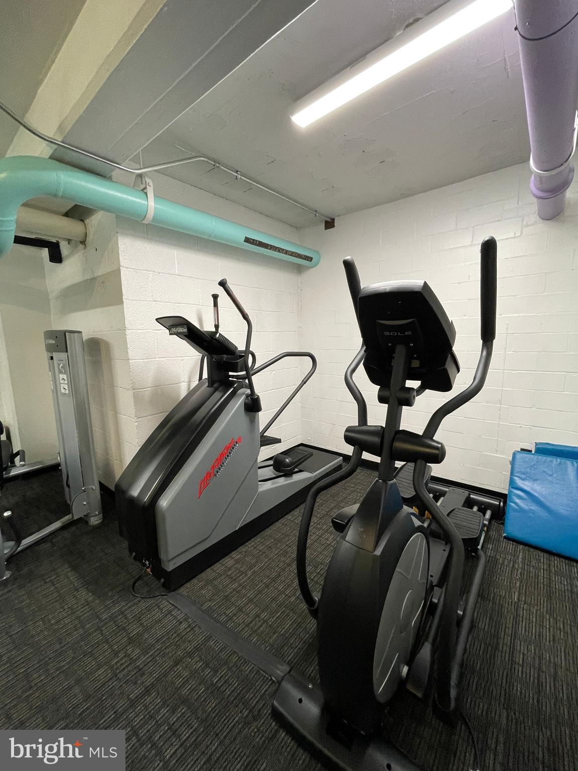 2475 Virginia Avenue Northwest, Unit 411 Washington, DC 20037 - Photo 9 of 20 a room with gym equipment