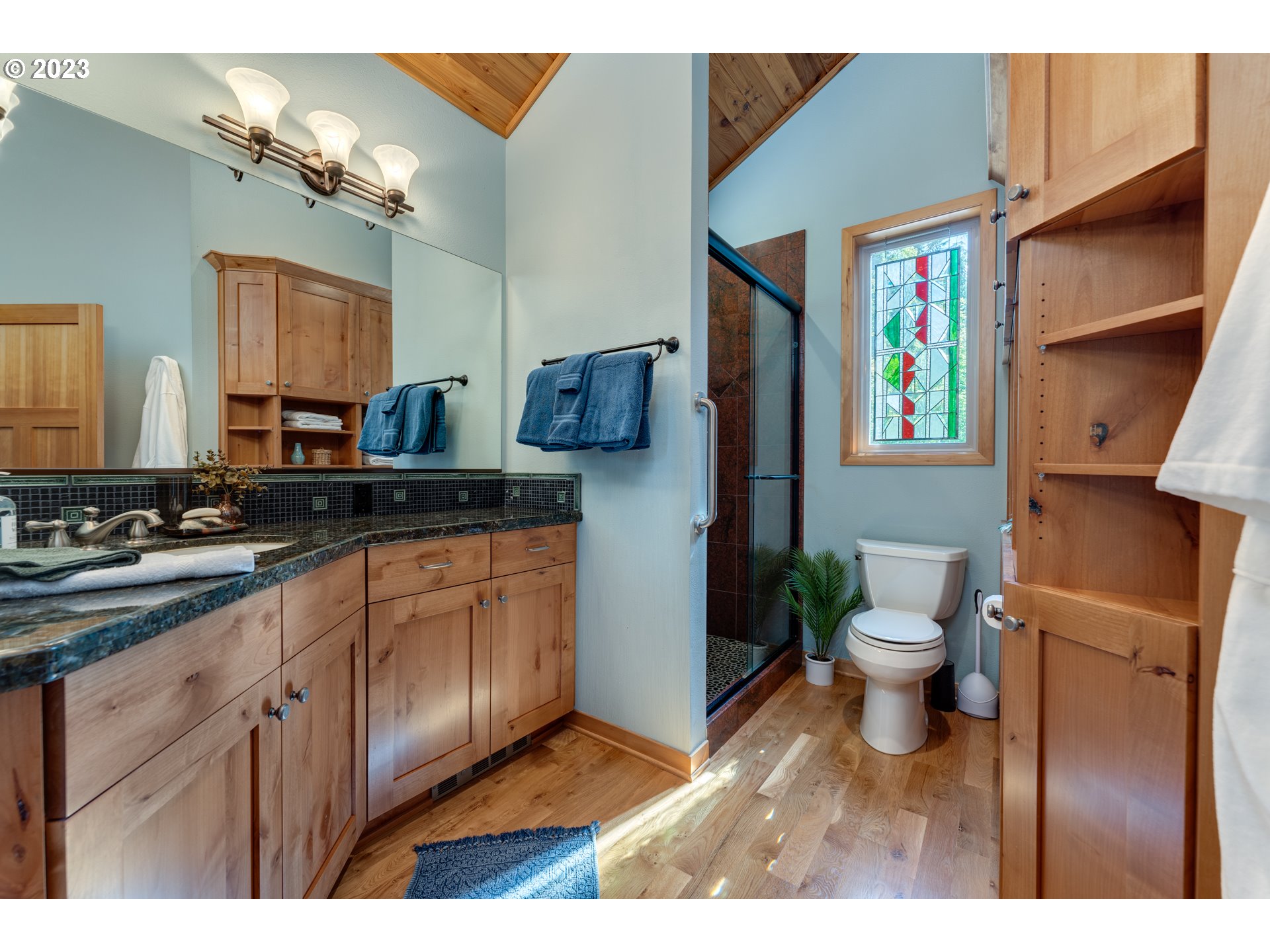 20715 East Glacier View Road Rhododendron, OR 97049 - Photo 26 of 41 a bathroom with a sink a toilet and mirror