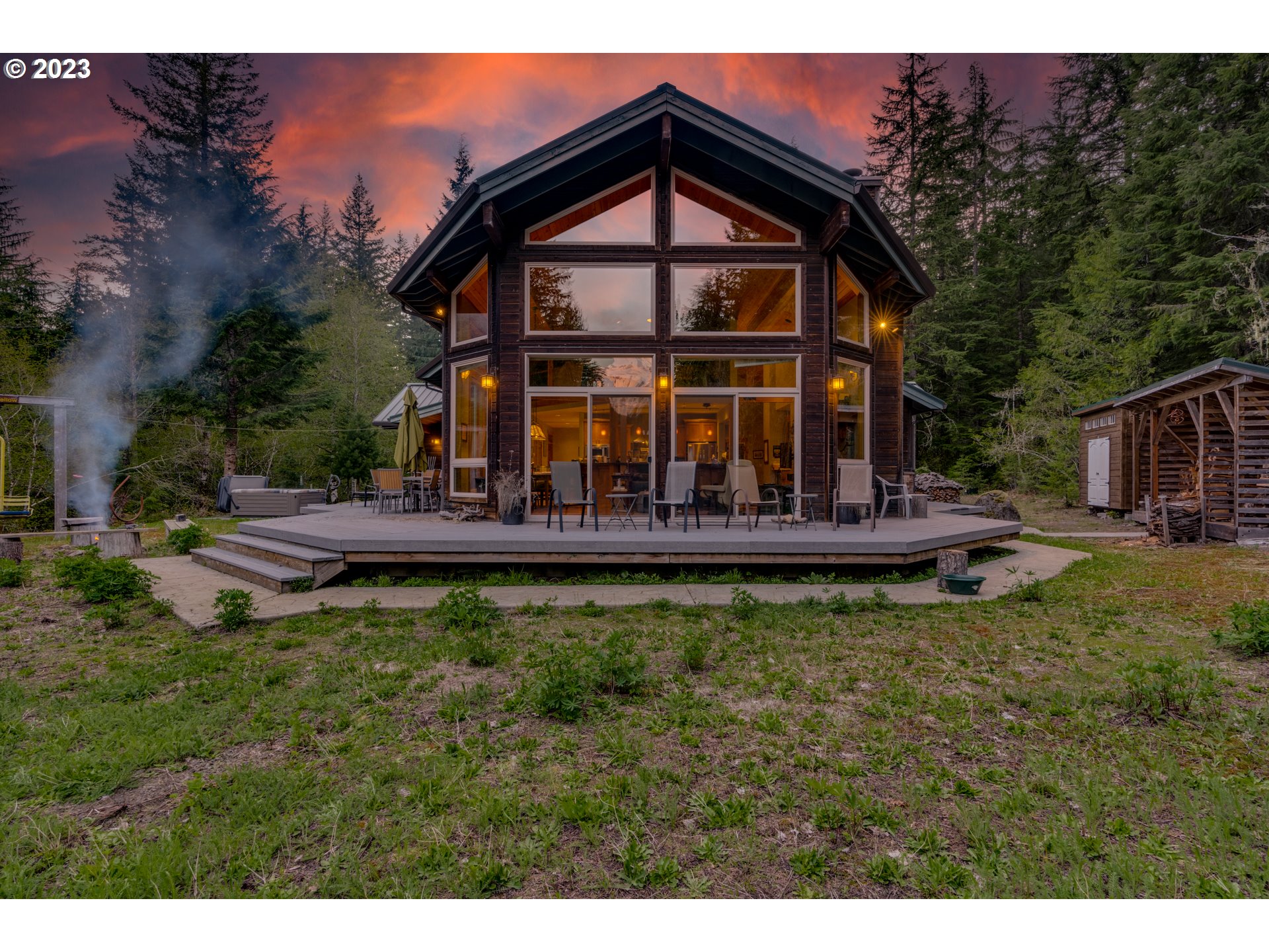 20715 East Glacier View Road Rhododendron, OR 97049 - Photo 5 of 41 a view of a house with a yard