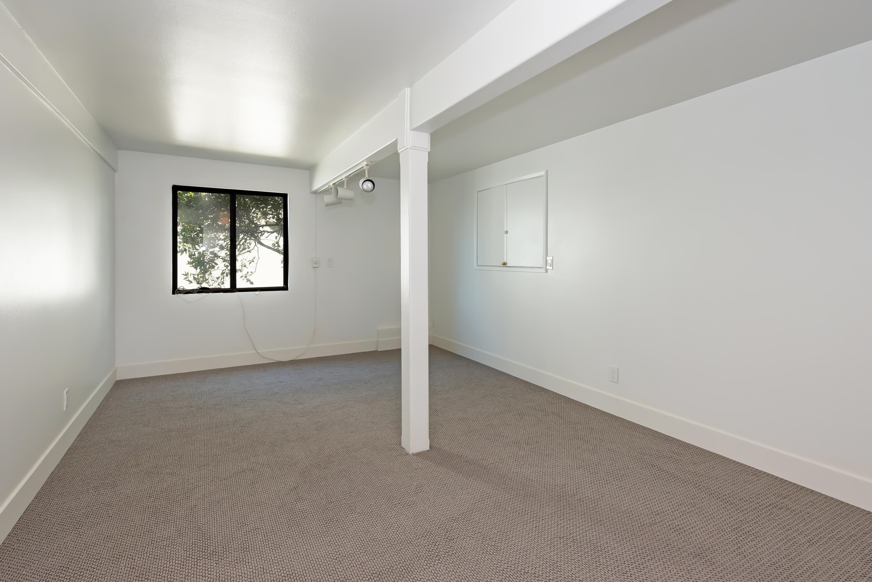 34 Rubio Road Santa Barbara, CA 93103 - Photo 12 of 22 an empty room with windows