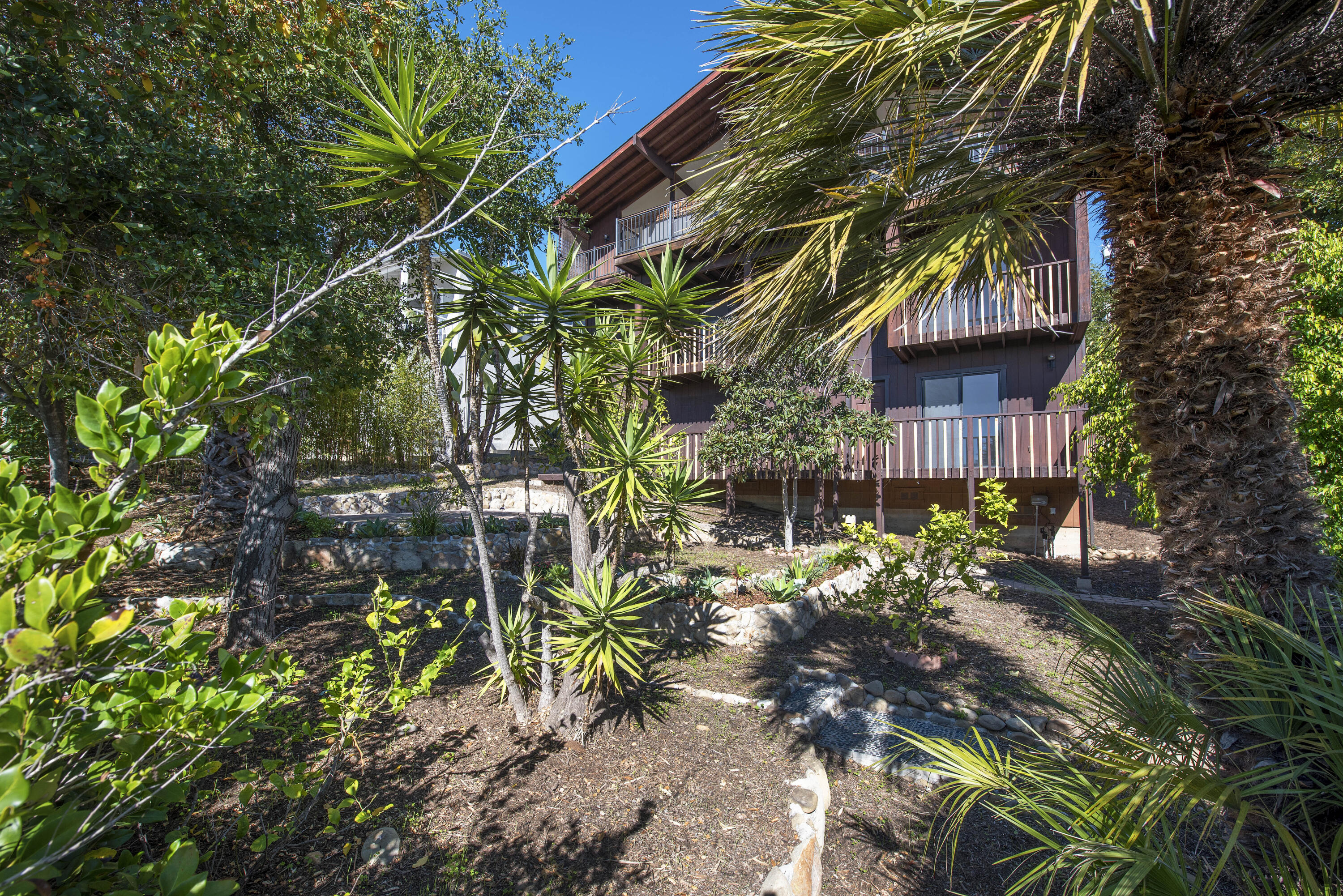 34 Rubio Road Santa Barbara, CA 93103 - Photo 19 of 22 a backyard of a house with lots of green space