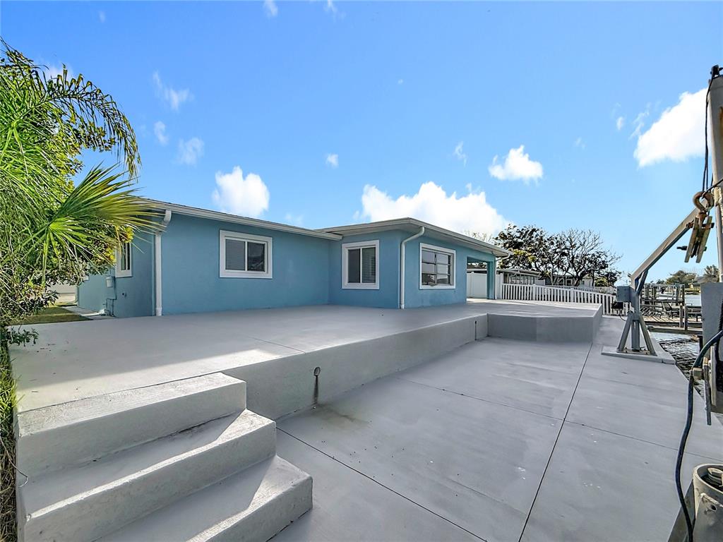 4869 Shell Stream Boulevard New Port Richey, FL 34652 - Photo 14 of 46 a view of a house with a patio