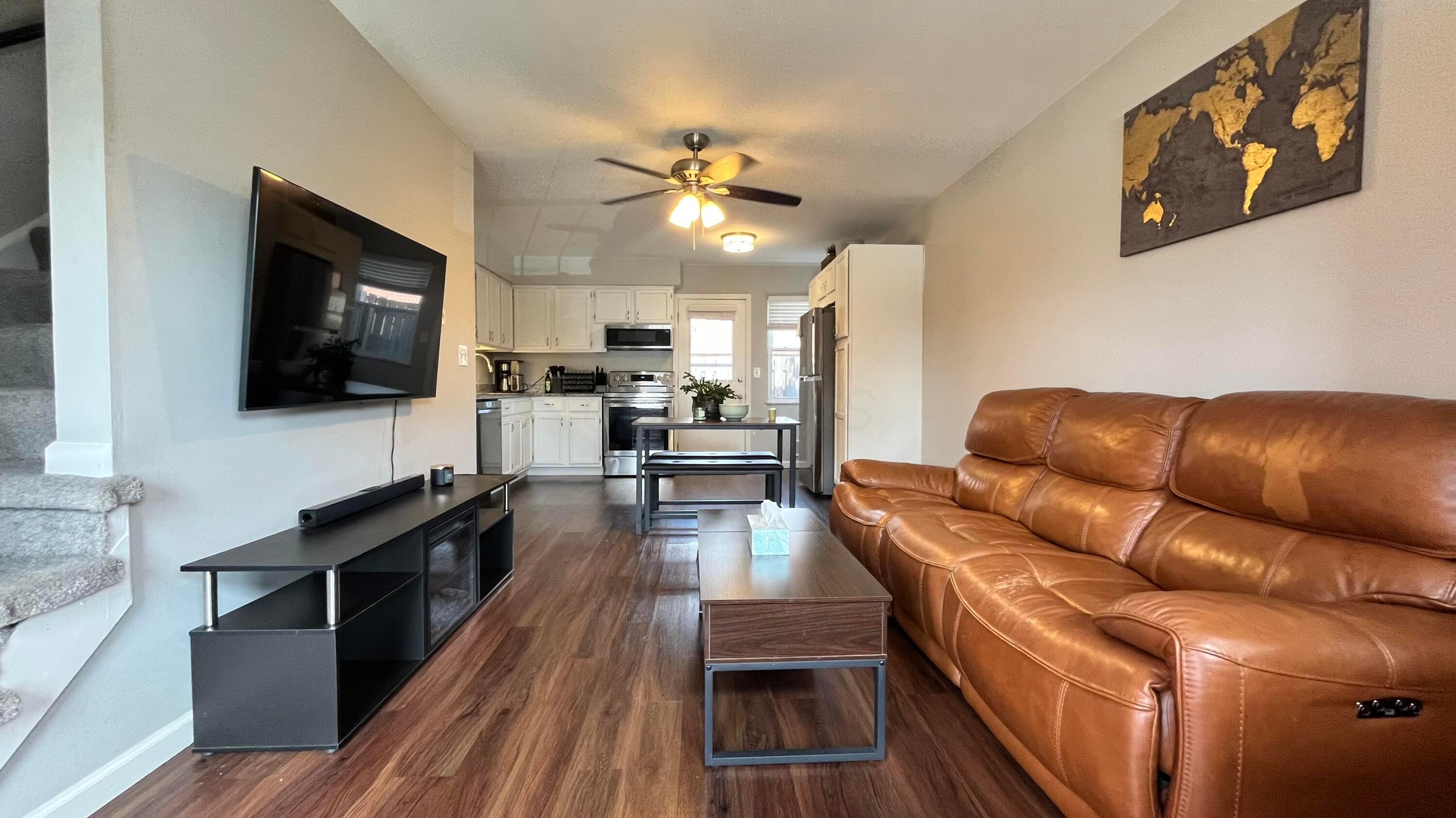 5696 Beechcroft Road, Unit B Columbus, OH 43229 - Photo 2 of 16 Spacious living room opens into the kitchen.
