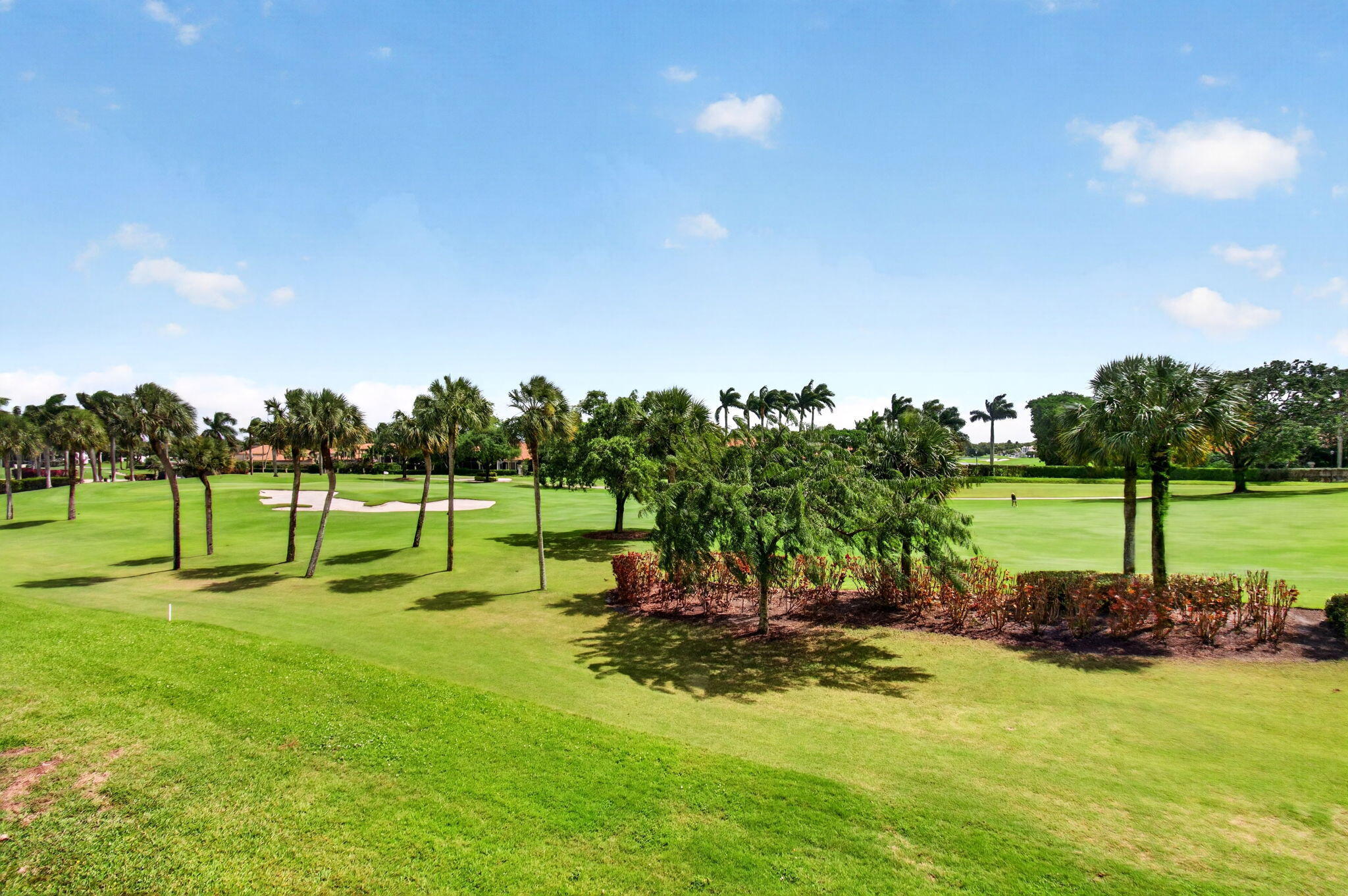 2530 Coco Plum Boulevard, Unit 1002 Boca Raton, FL 33496 - Photo 33 of 61 a view of a park with swings