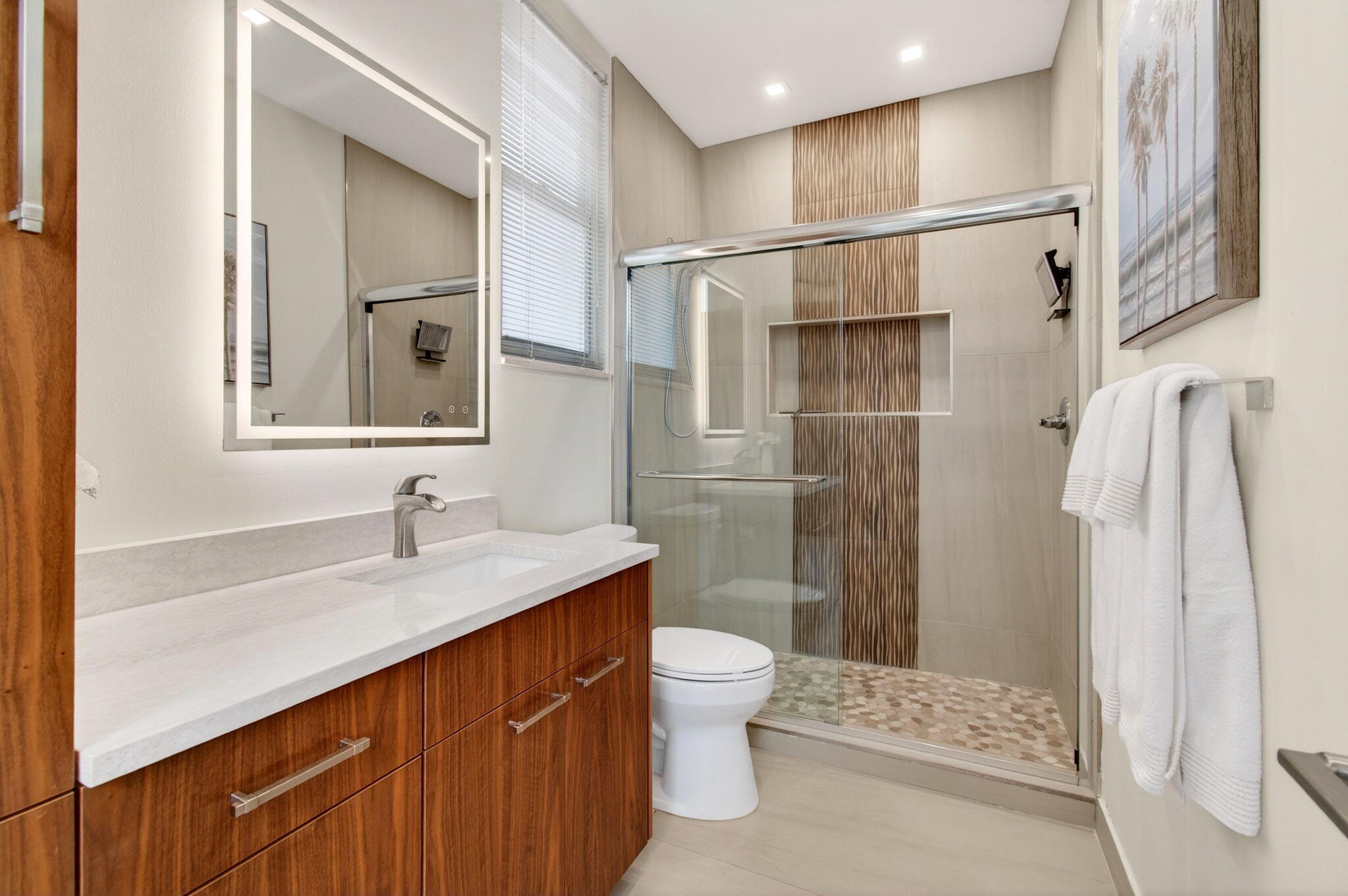 2530 Coco Plum Boulevard, Unit 1002 Boca Raton, FL 33496 - Photo 45 of 61 a bathroom with a sink toilet and shower