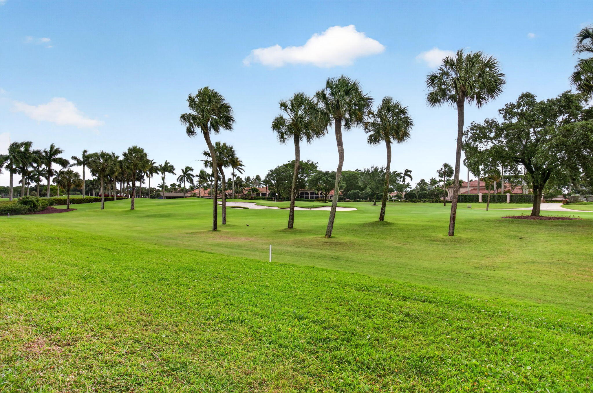2530 Coco Plum Boulevard, Unit 1002 Boca Raton, FL 33496 - Photo 48 of 61 a view of a park with a big yard