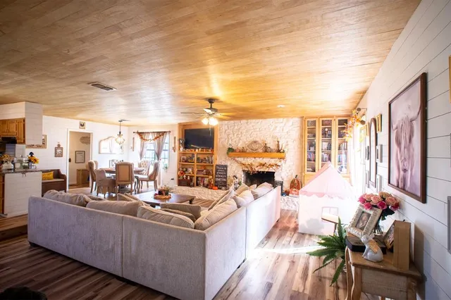 a living room with furniture and a table