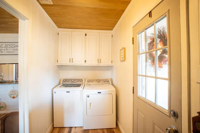 a view of a yard with trees