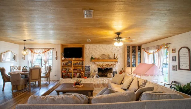 a view of a living room with furniture