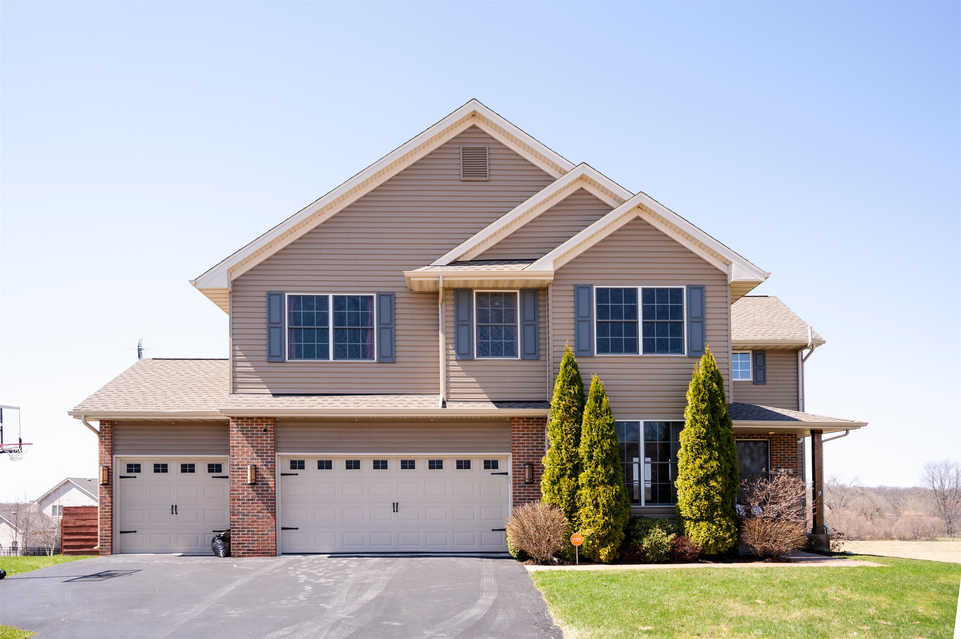 314 Brocket Trail Belvidere, IL 61008 - Photo 1 of 46 a view of a house with large windows and yard