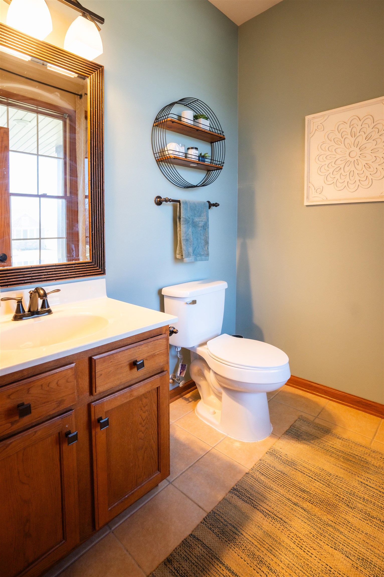 314 Brocket Trail Belvidere, IL 61008 - Photo 18 of 46 a bathroom with a sink a toilet and a window