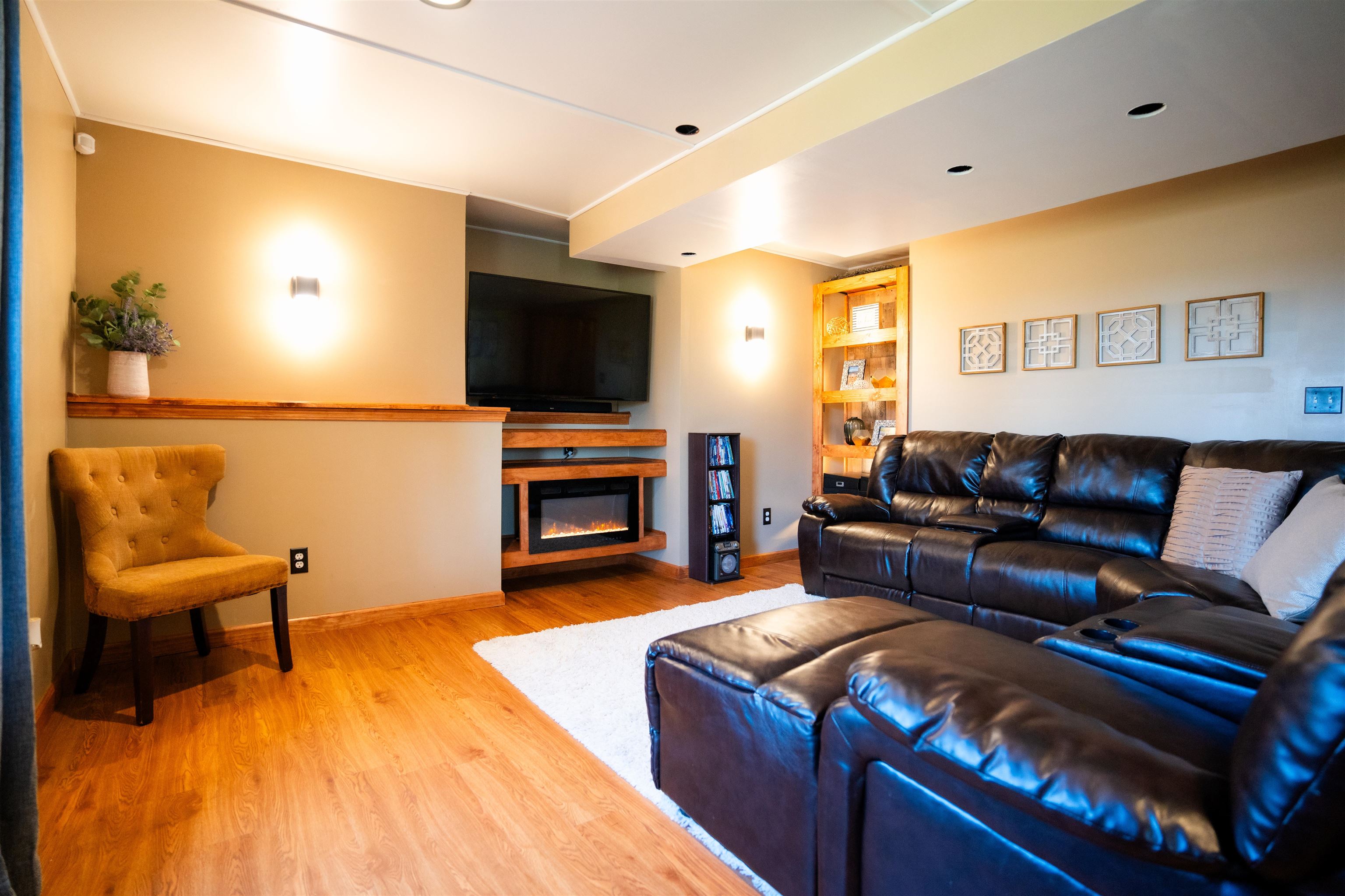 314 Brocket Trail Belvidere, IL 61008 - Photo 36 of 46 a living room with furniture and a flat screen tv