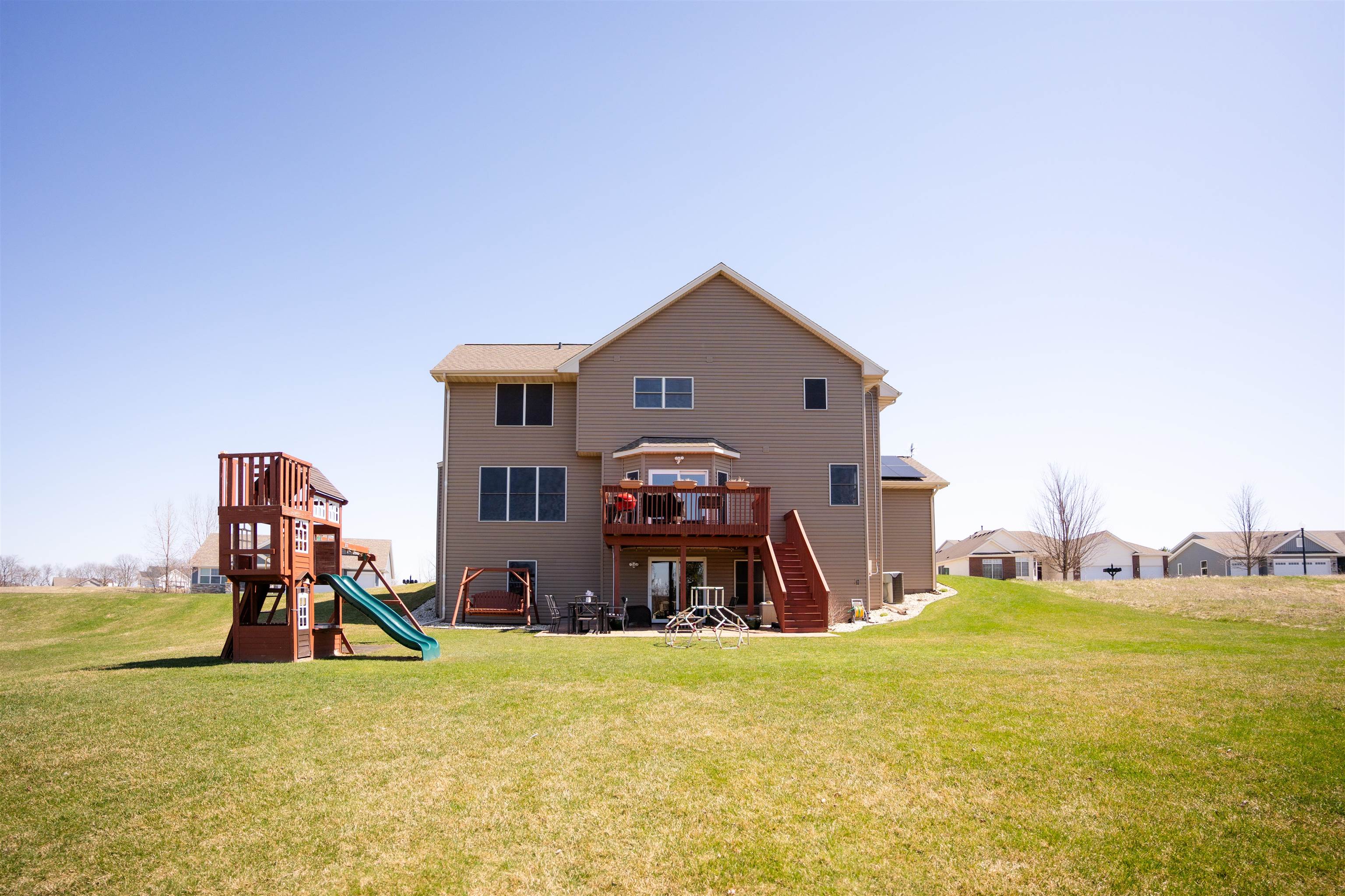314 Brocket Trail Belvidere, IL 61008 - Photo 4 of 46 a view of a house with a big yard and large trees