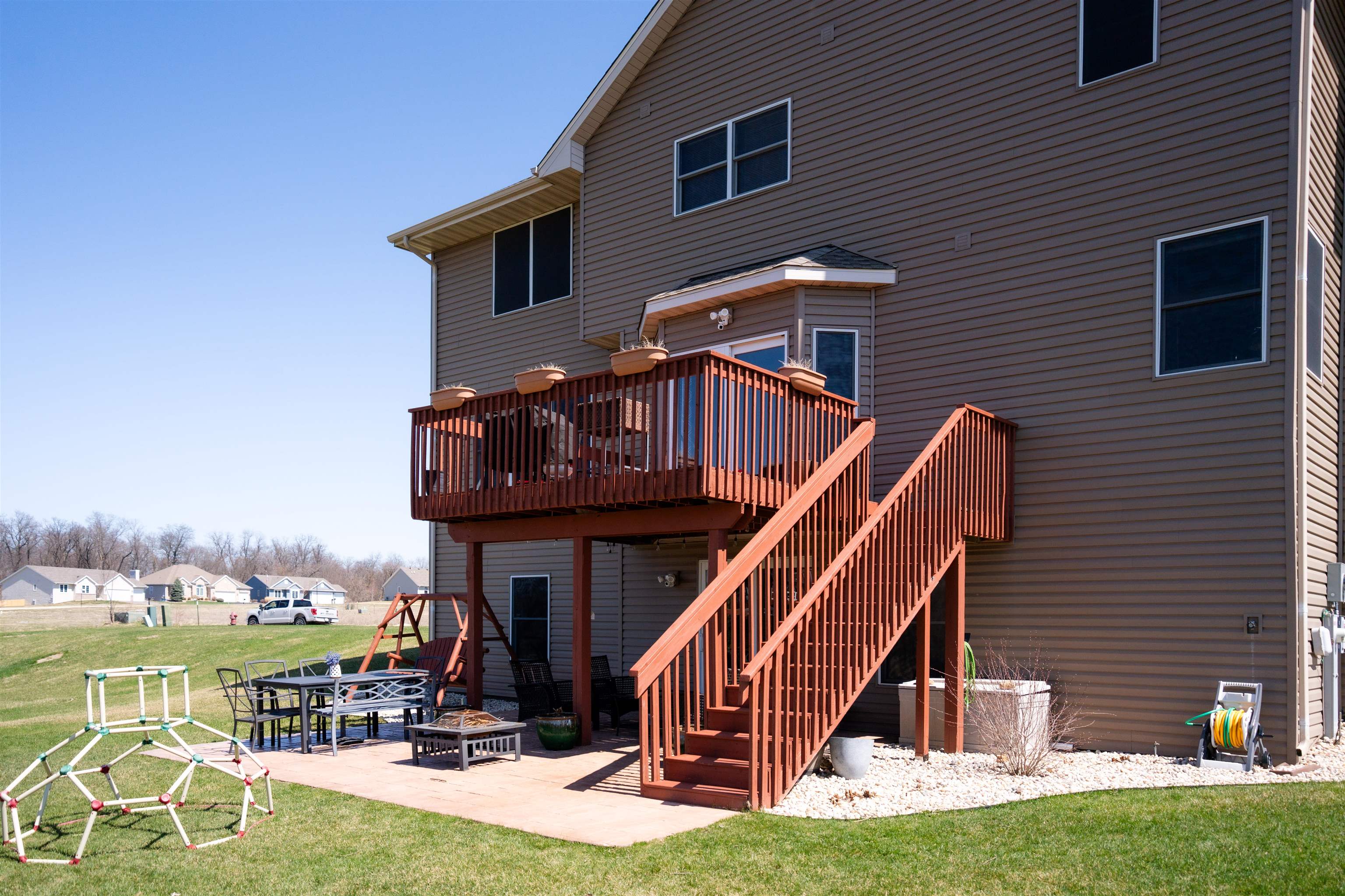 314 Brocket Trail Belvidere, IL 61008 - Photo 43 of 46 a view of a house with wooden deck and furniture