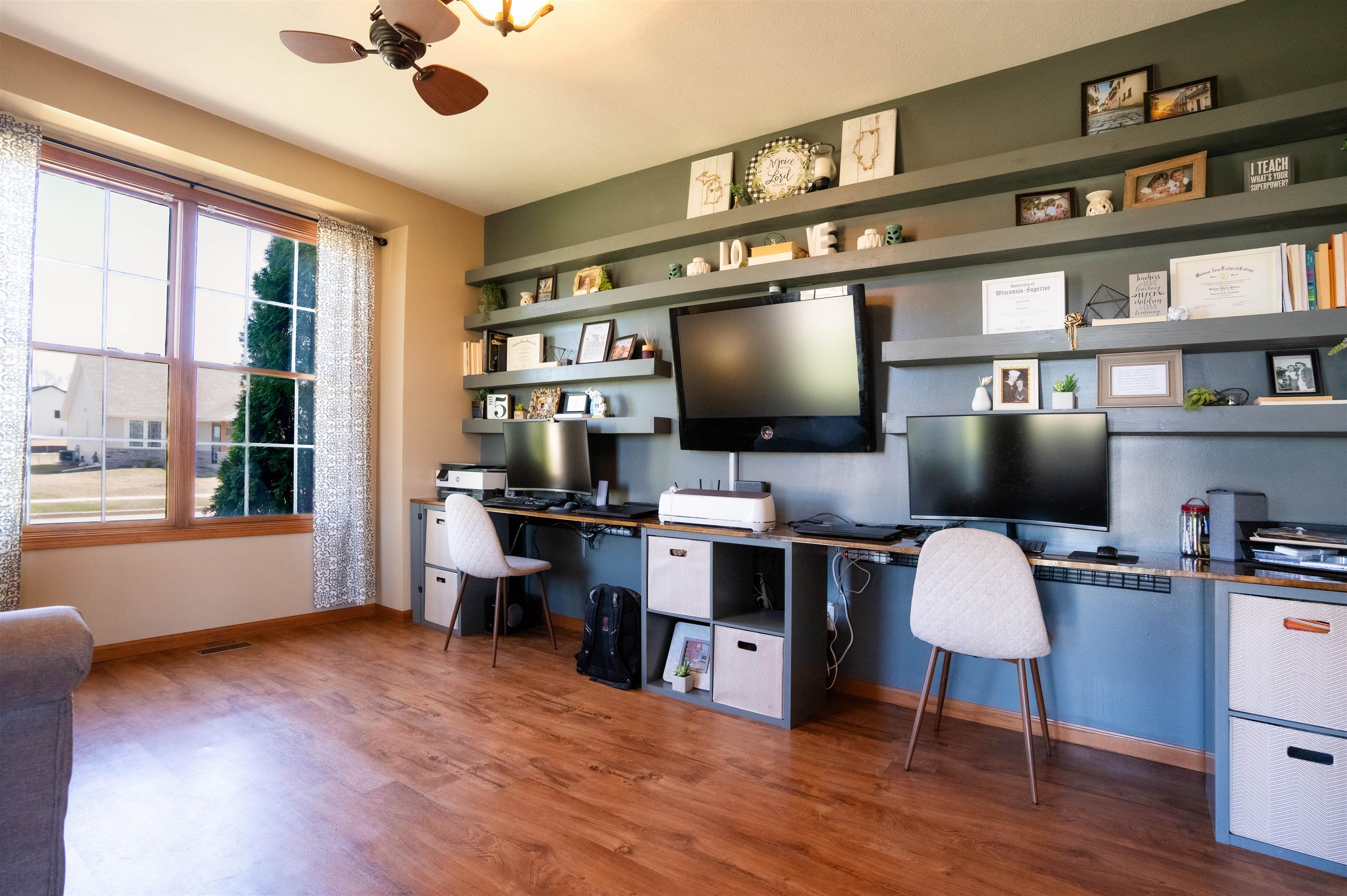 314 Brocket Trail Belvidere, IL 61008 - Photo 7 of 46 a workspace with furniture hardwood and a flat screen tv