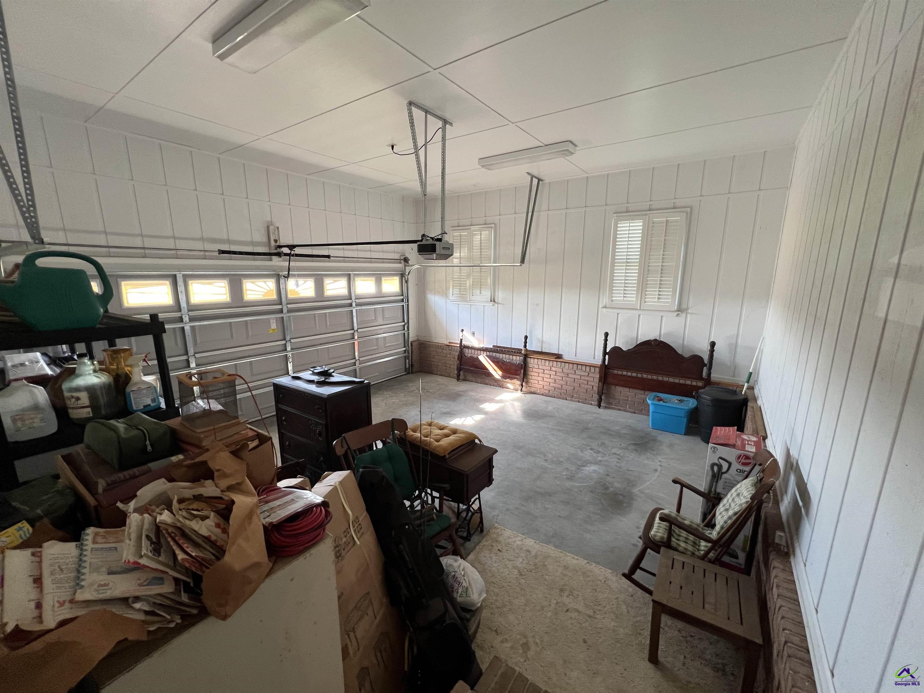 762 Nicholson-Carr Road Chester, GA 31012 - Photo 32 of 81 a room with gym equipment and a view of living room