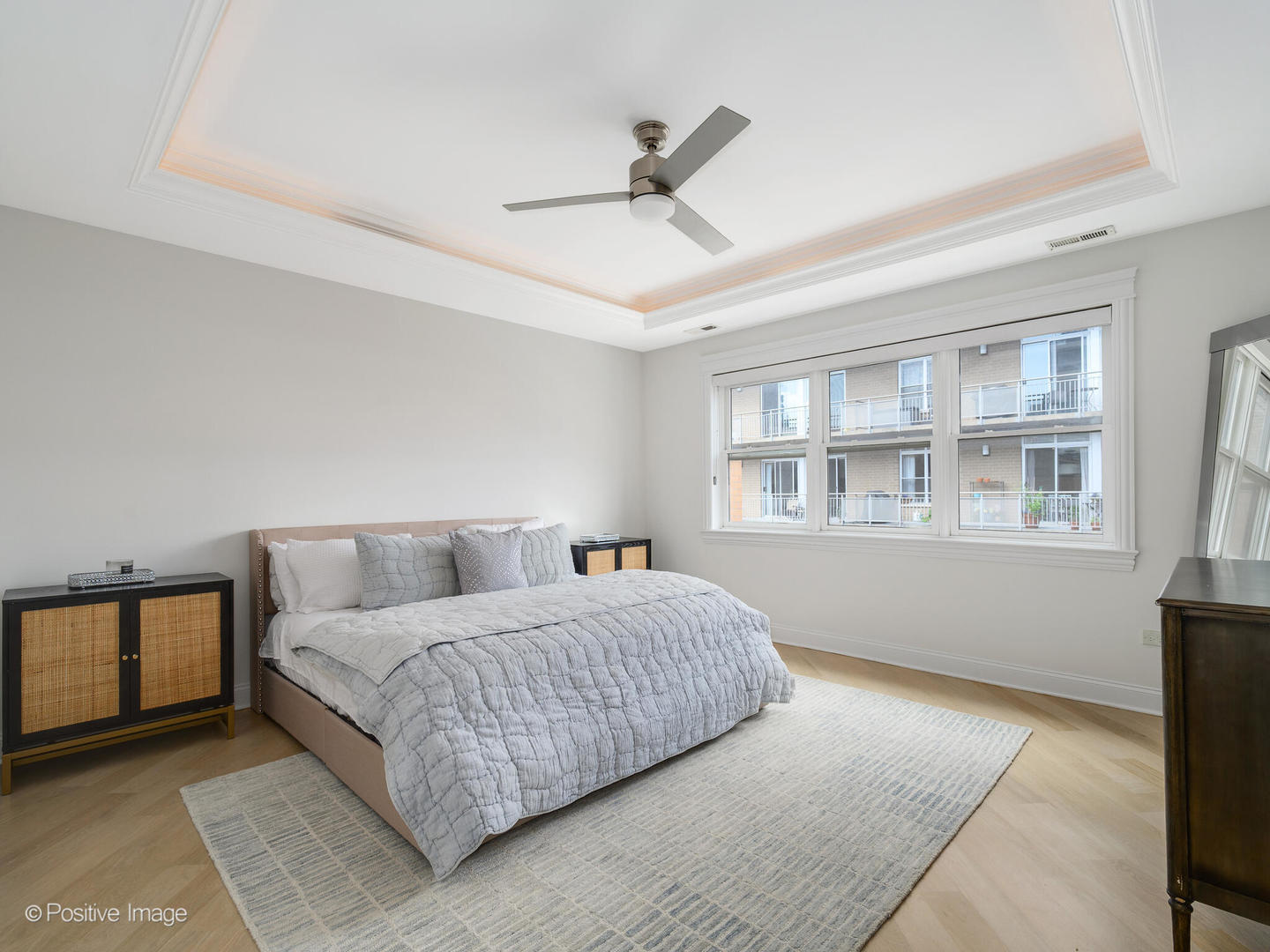 106 South Sangamon Street, Unit 4S Chicago, IL 60607 - Photo 11 of 28 a bedroom with a bed and a window