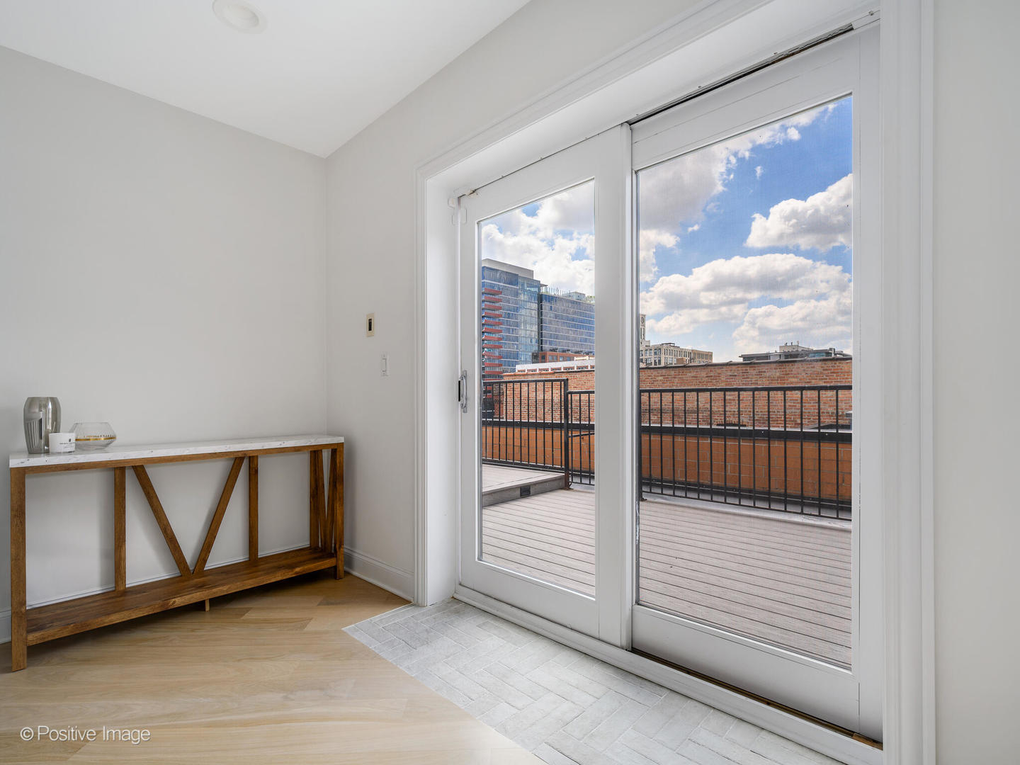 106 South Sangamon Street, Unit 4S Chicago, IL 60607 - Photo 19 of 28 a view of a porch with wooden floor