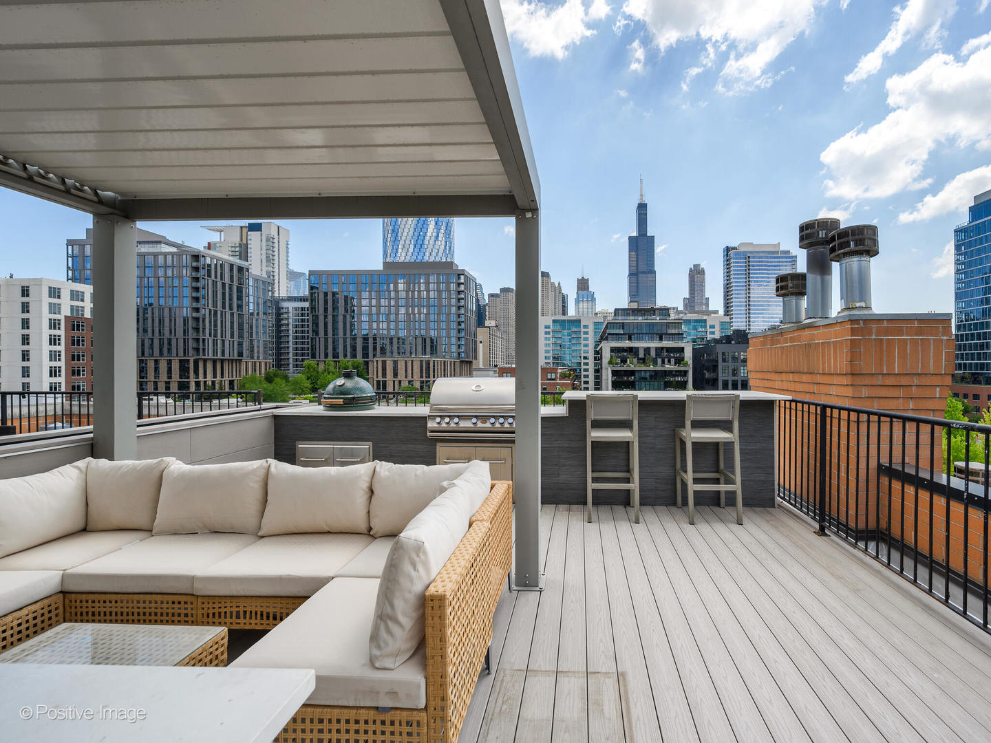 106 South Sangamon Street, Unit 4S Chicago, IL 60607 - Photo 21 of 28 a balcony with furniture and a potted plant