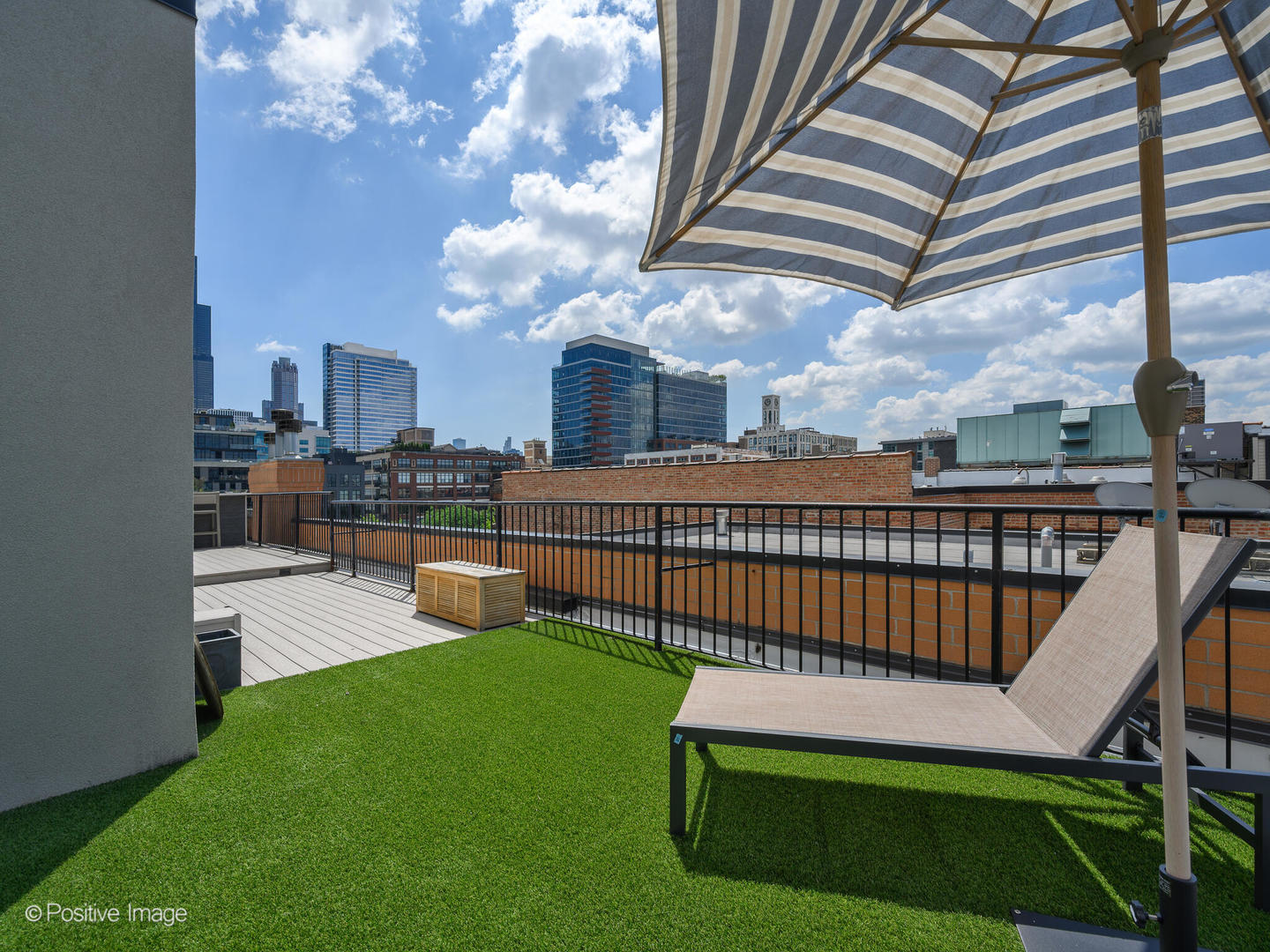 106 South Sangamon Street, Unit 4S Chicago, IL 60607 - Photo 26 of 28 a view of a patio with a yard