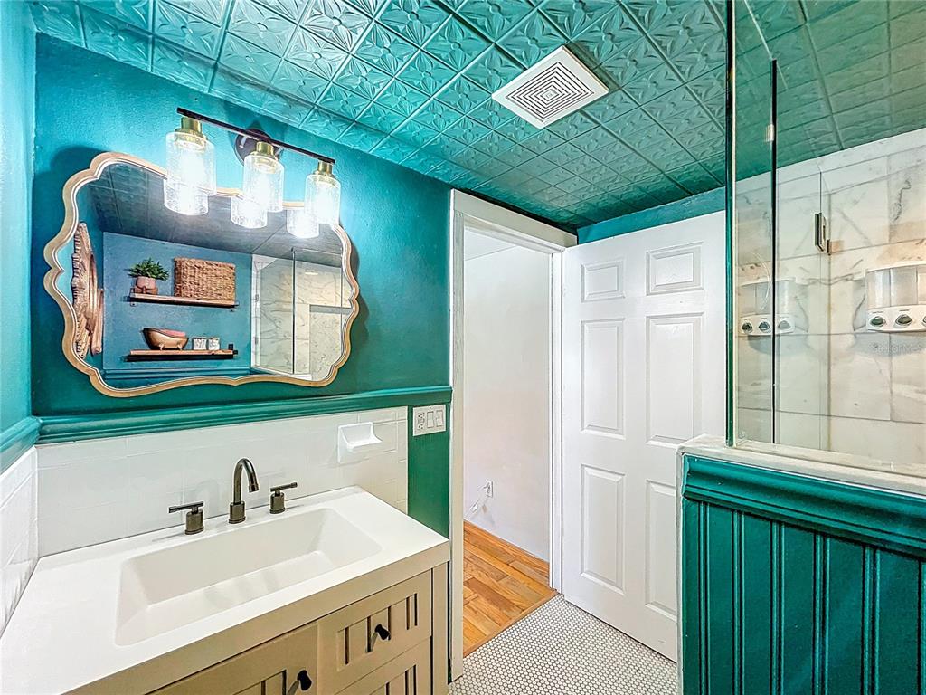 5870 Jim Davis Road Parrish, FL 34219 - Photo 24 of 39 Notice the original, tin ceiling that was popular back in the day!
