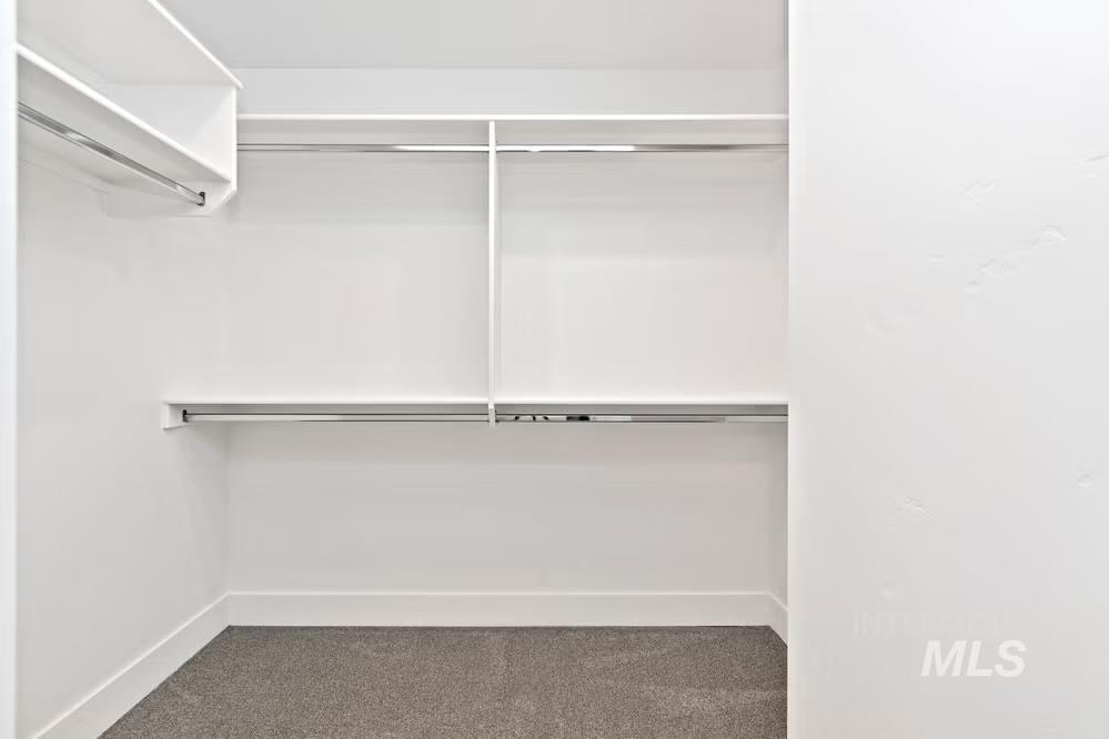 744 South Calhoun Lane Star, ID 83669 - Photo 17 of 34 Spacious closet with dark colored carpet