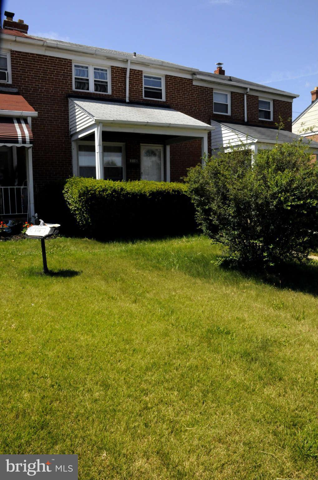 516 Queensgate Road Baltimore, MD 21229 - Photo 27 of 27 a view of a house with pool yard and a yard
