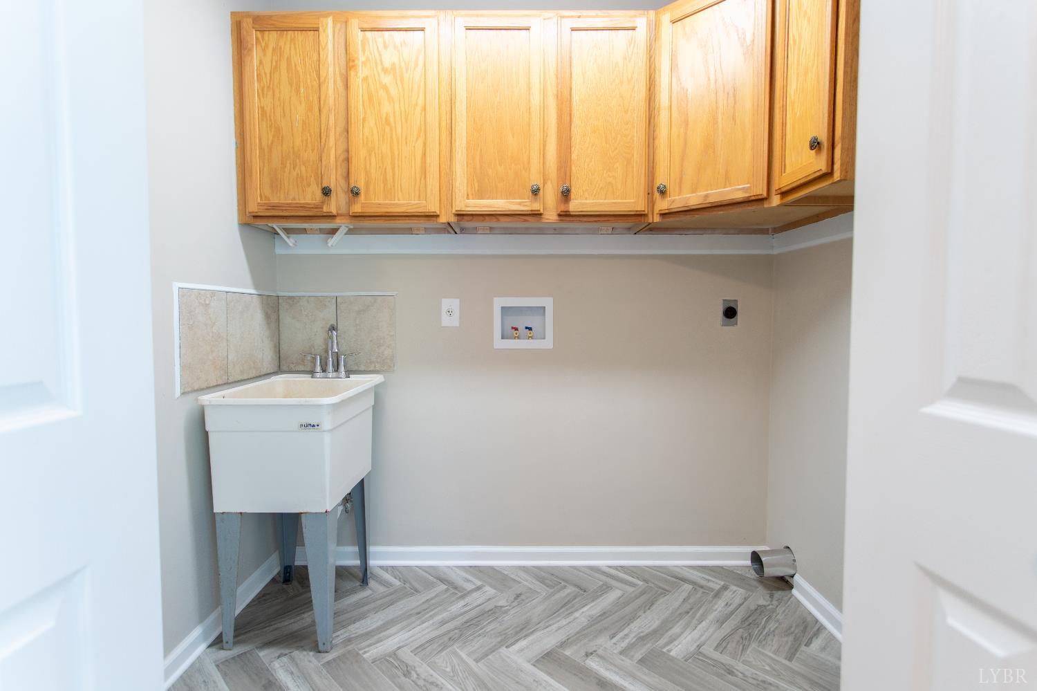 549 Thrashers Creek Road Amherst, VA 24521 - Photo 22 of 66 a bathroom with a sink and a window