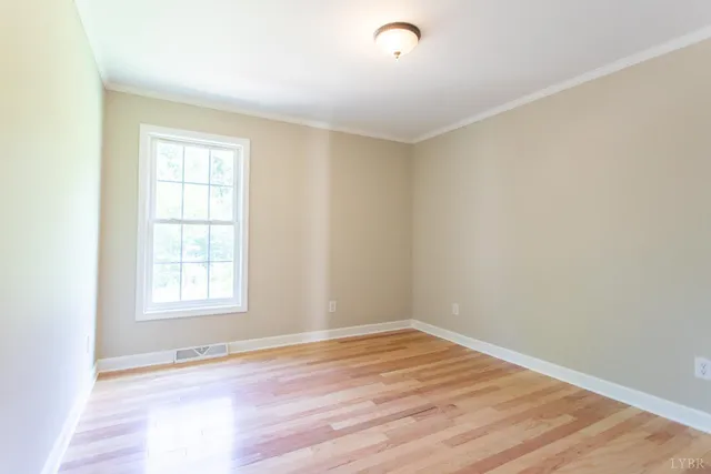 a view of living room with furniture and window
