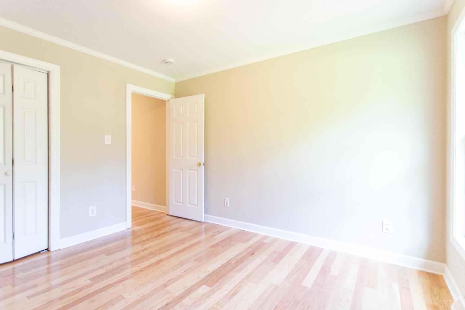 549 Thrashers Creek Road Amherst, VA 24521 - Photo 34 of 66 a view of a room with wooden floor