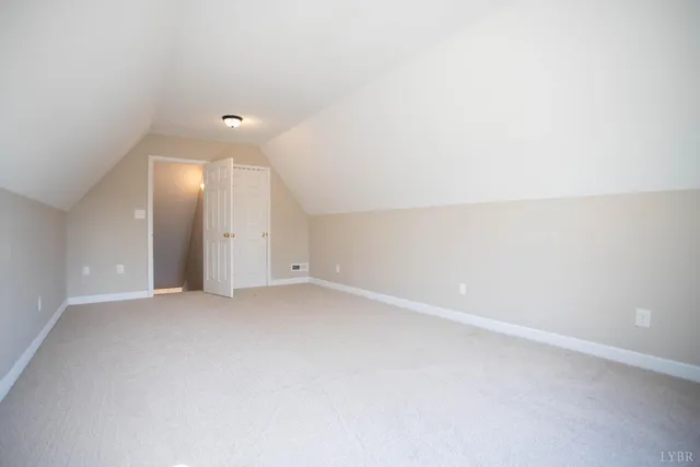 a view of swimming pool with a small yard