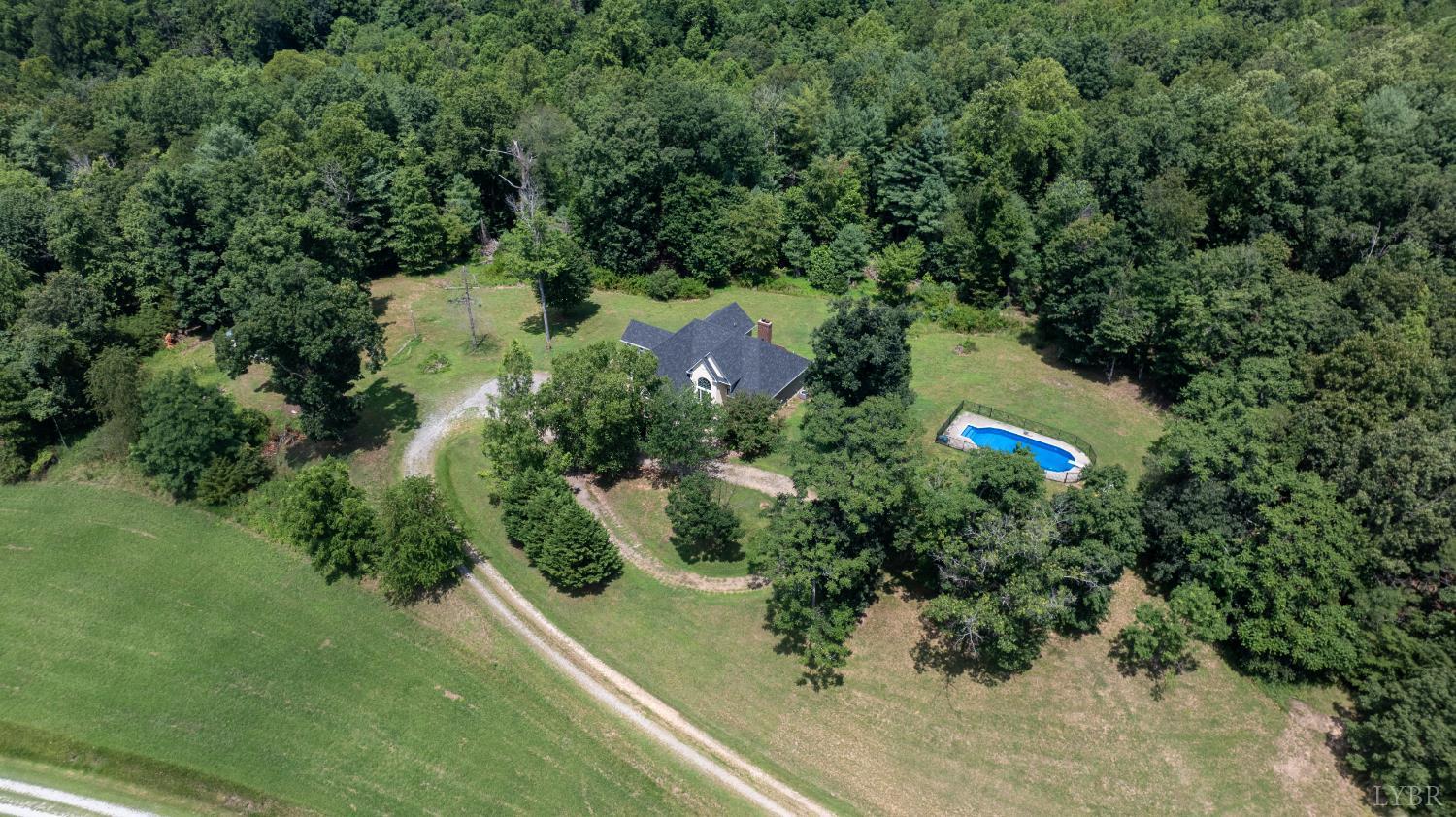 549 Thrashers Creek Road Amherst, VA 24521 - Photo 7 of 66 an aerial view of residential house with outdoor space and trees all around
