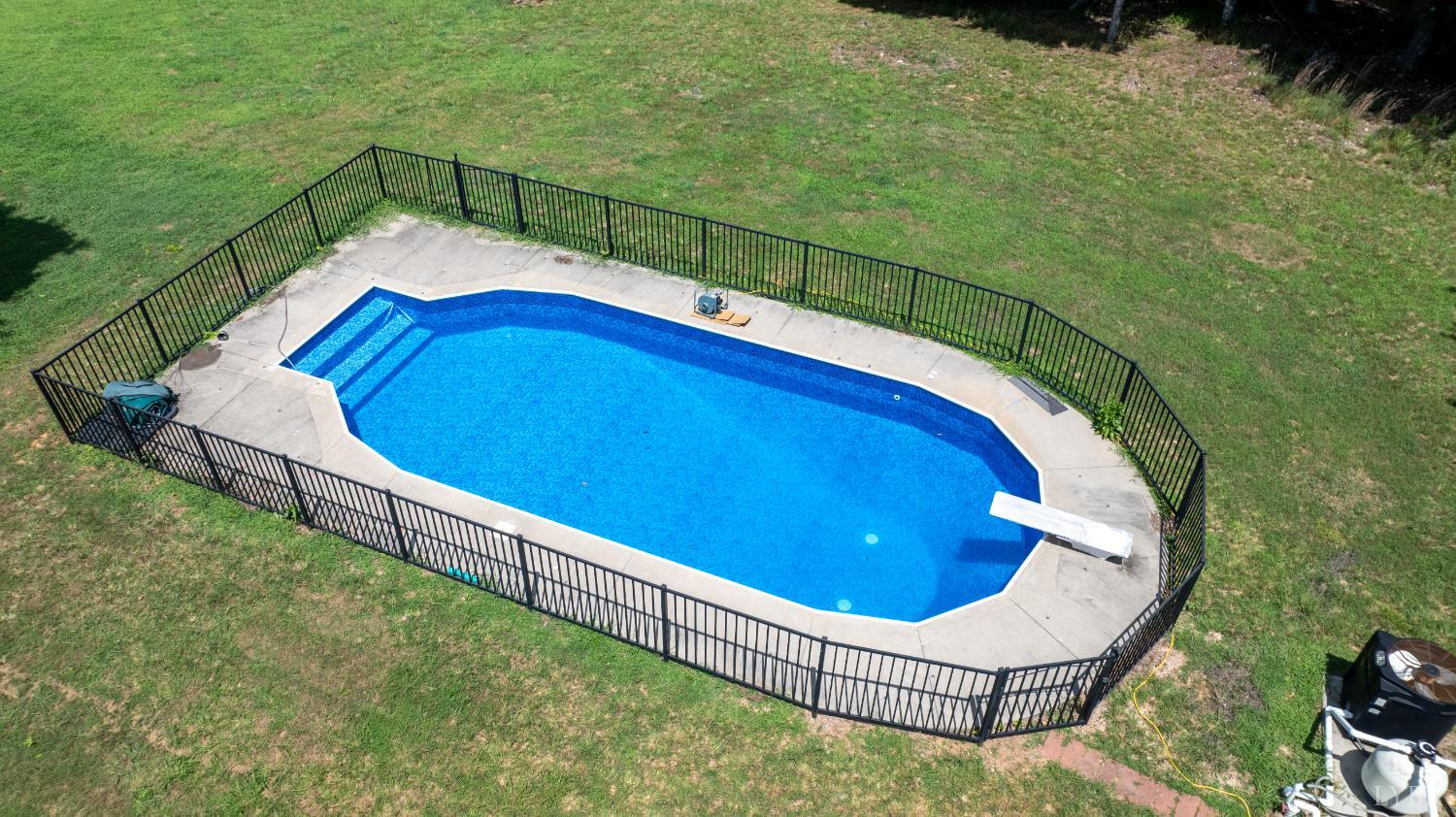 549 Thrashers Creek Road Amherst, VA 24521 - Photo 10 of 66 a wooden bench sitting in the middle of a park