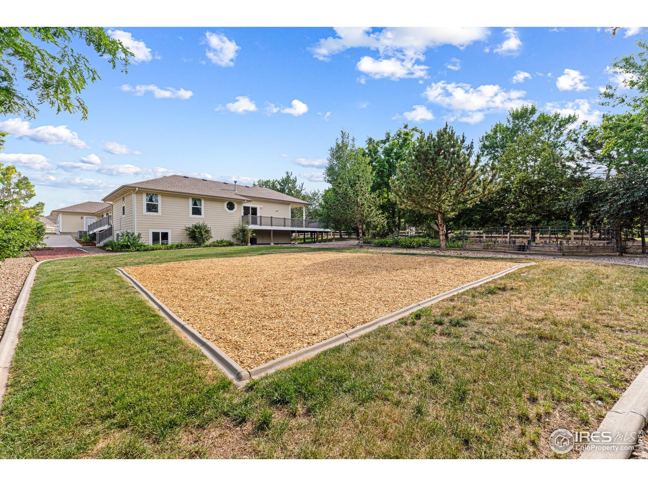 6495 Eagle Shadow Avenue Brighton, CO 80602 - Photo 37 of 40 a view of swimming pool with an outdoor space and seating area