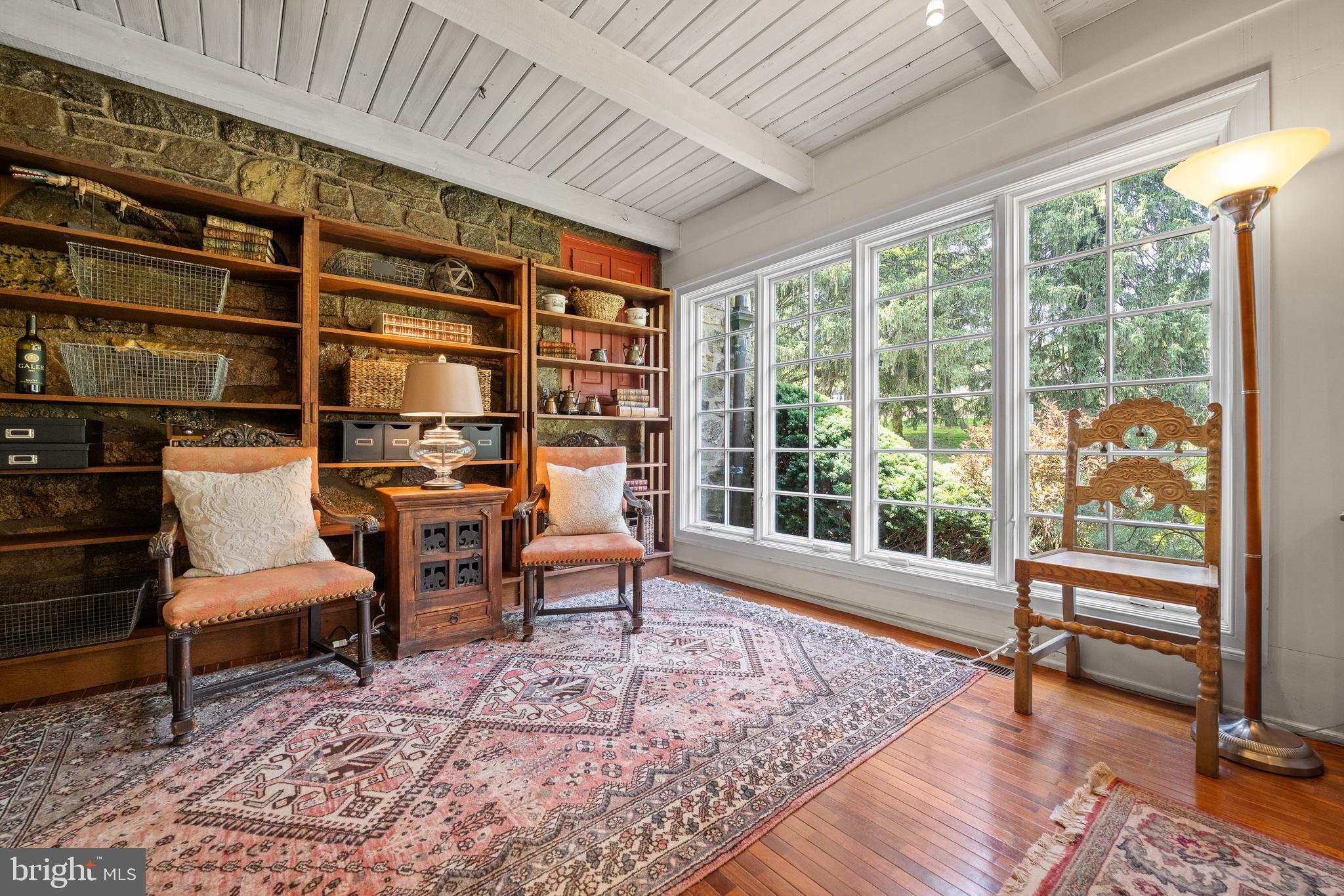 1740 Lenape Road West Chester, PA 19382 - Photo 26 of 91 a living room with furniture and a floor to ceiling window