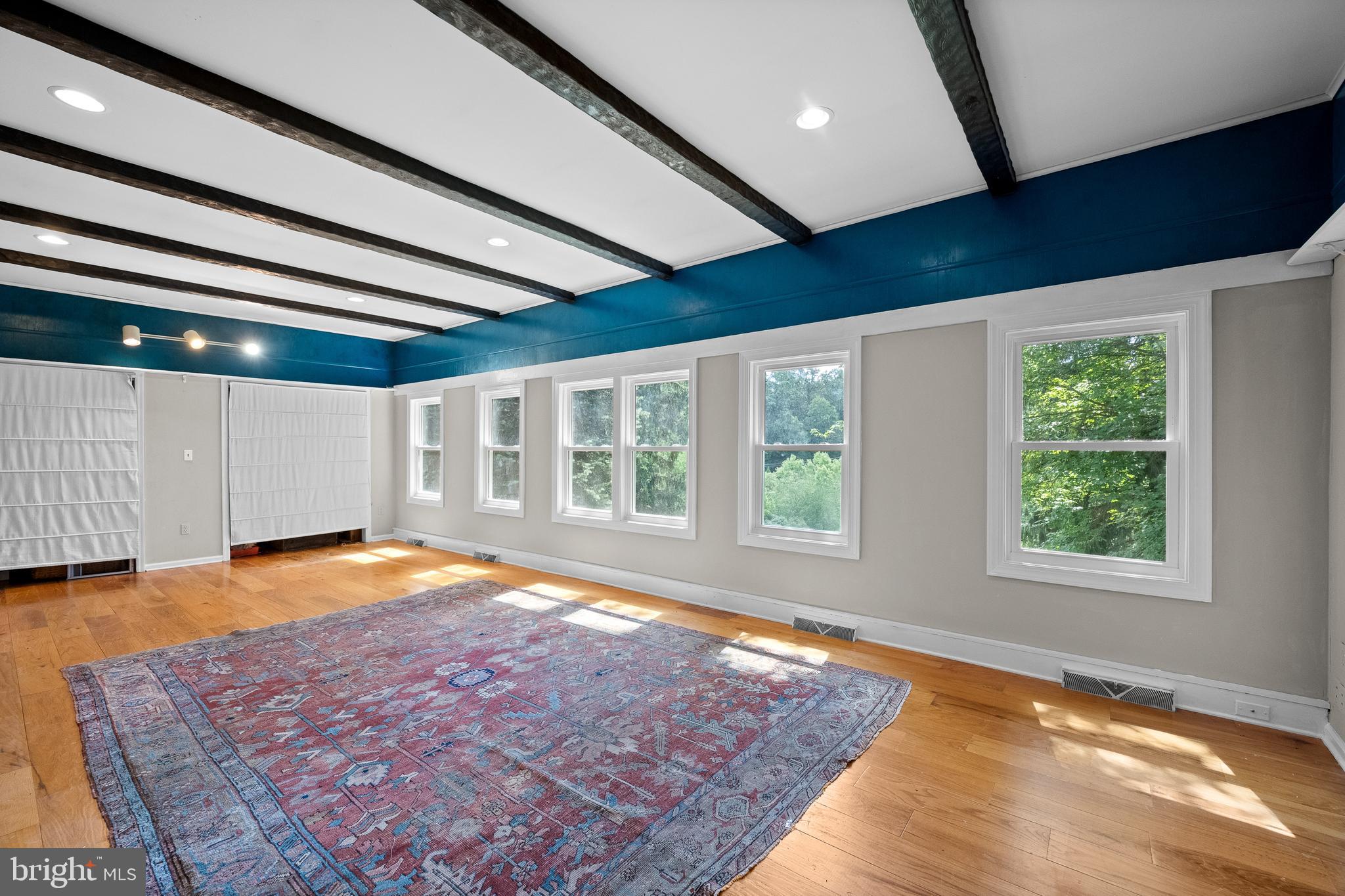 1740 Lenape Road West Chester, PA 19382 - Photo 78 of 91 a view of an empty room with wooden floor and a window